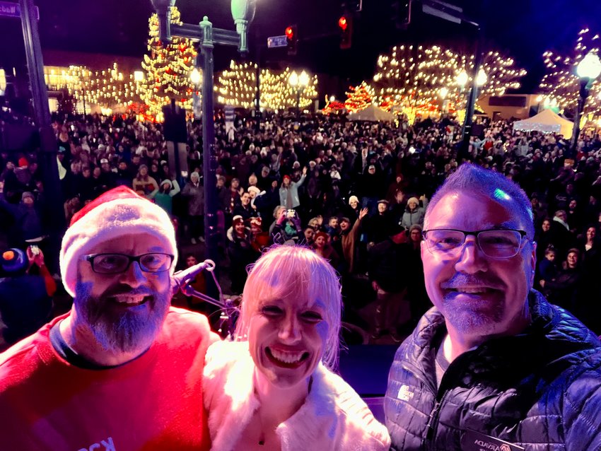 Selfie of Arvada City Councilmembers John Marriott (left), Lauren Simpson (center) and Bob Fifer (right) participating in the tree lighting.